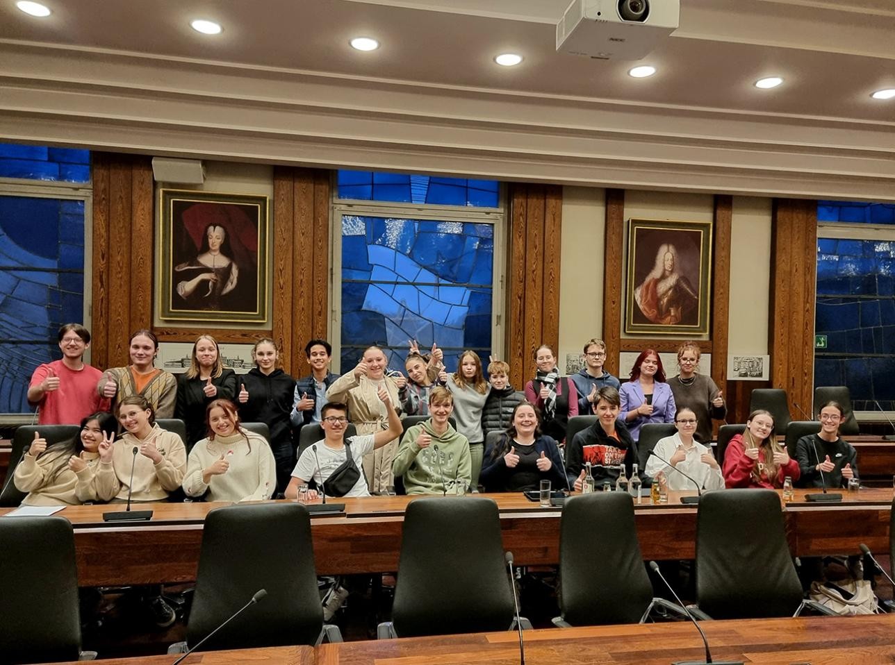 Group photo - the members of the youth delegation in the Council Chamber