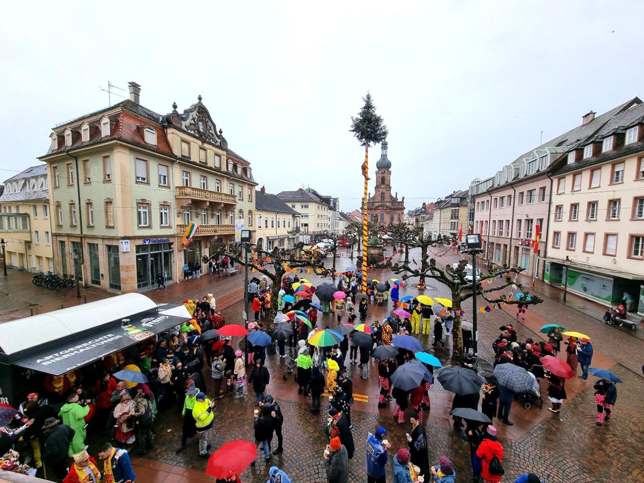 View of the market square with jesters from the town hall balcony