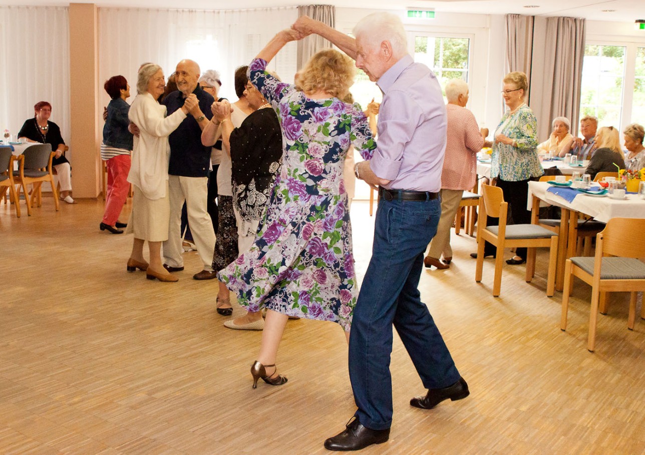 Seniors dance at a tea dance