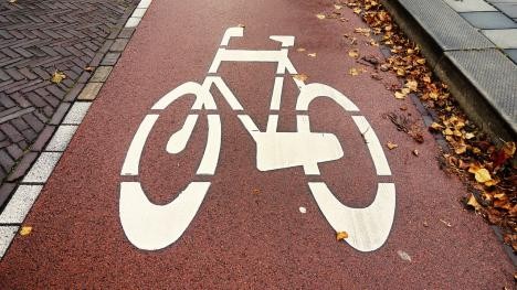 Symbol Fahrrad auf Fahrradweg