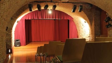 Stage and chairs in the basement theater in Rastatt