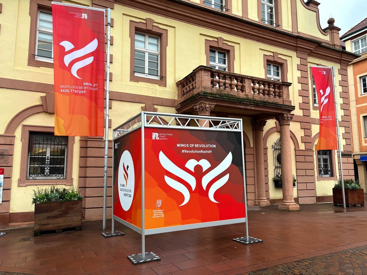 Information cube on 175 years of the Baden Revolution in front of the historic town hall in Rastatt