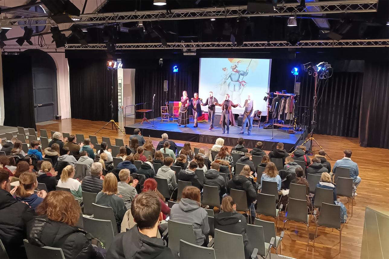 Actors take a bow on stage