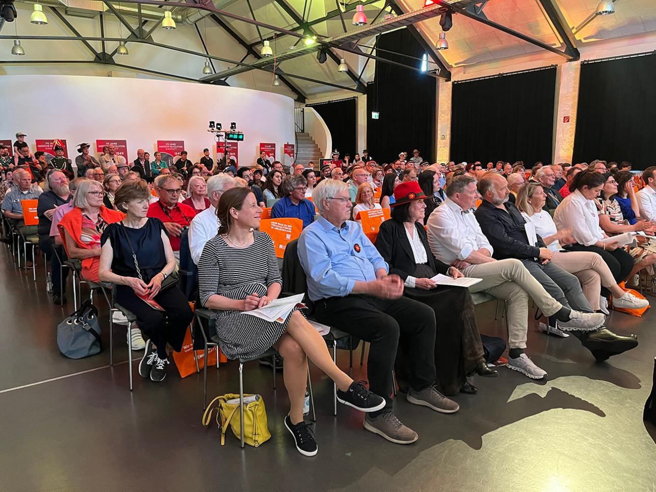 Audience in the riding arena at "Democracy in Dialogue"